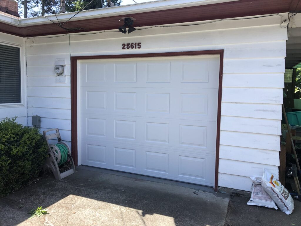 New insulated steel garage door after installation in Kent, WA