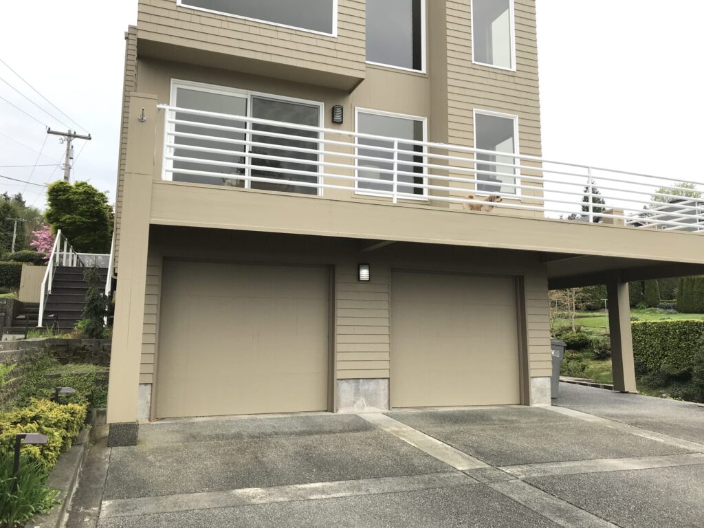 Old and weathered garage doors before replacement in Federal Way